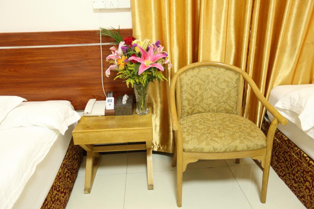 Guangzhou Airport Voyage Service Apartment Baiyun Airport Oda fotoğraf